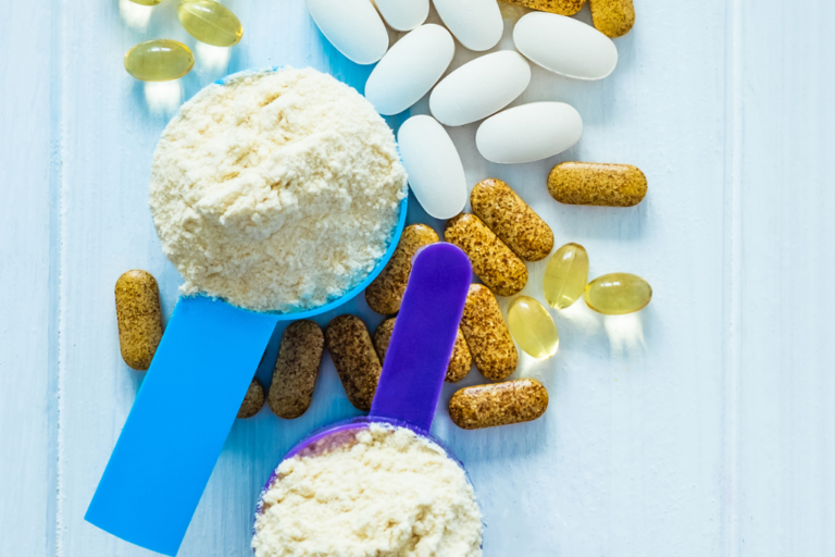 Photo of protein powder and health supplements.