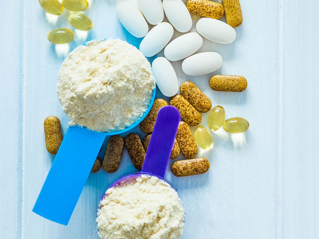 Photo of protein powder and health supplements.