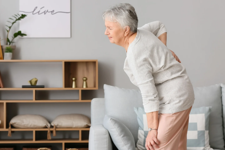 Senior Woman Suffering From Backache